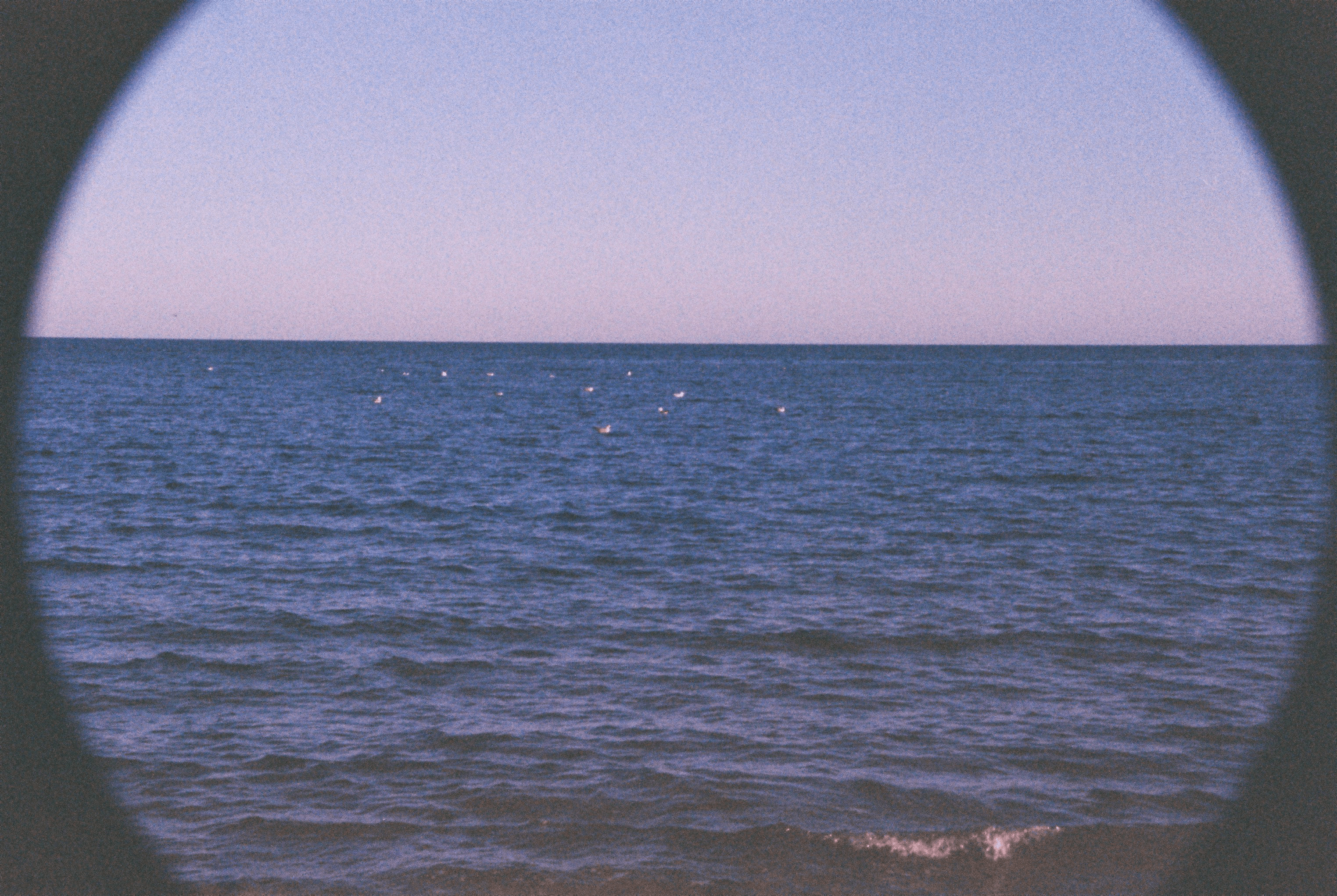 Photo of seaside in Romania, with vignette and prominent grain.