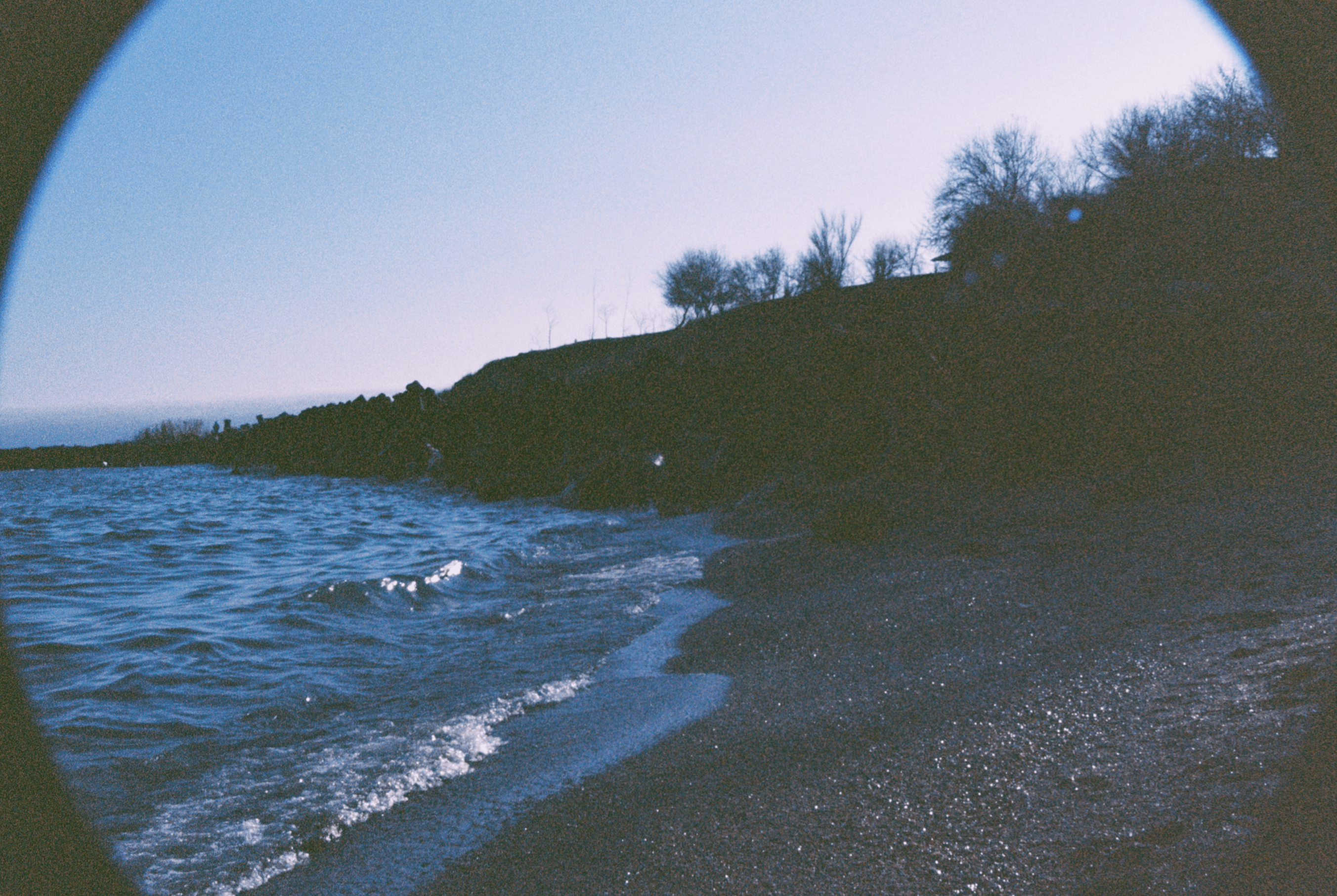 Photo of seaside in Romania, with vignette and prominent grain.