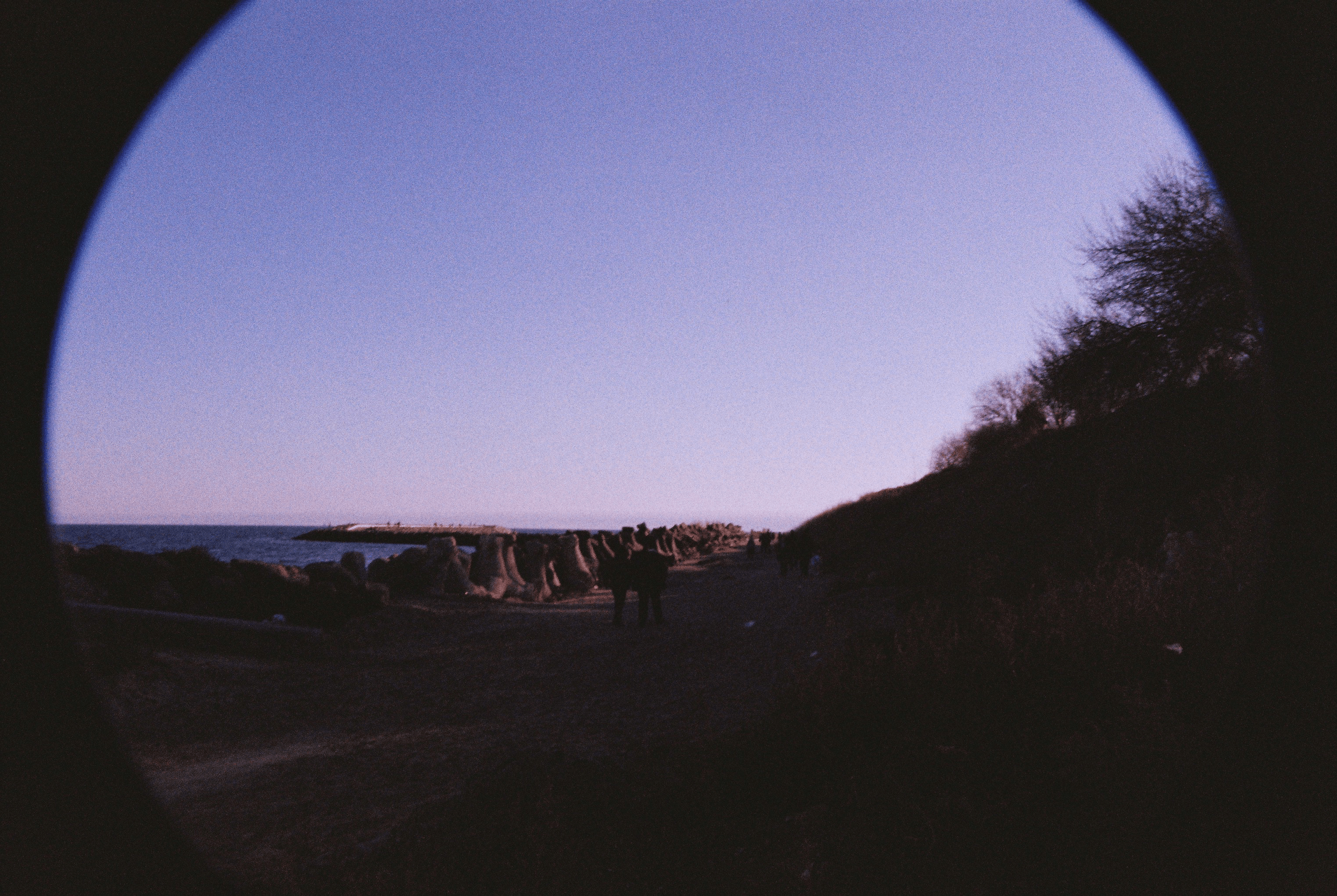 Photo of seaside in Romania, with vignette and prominent grain.