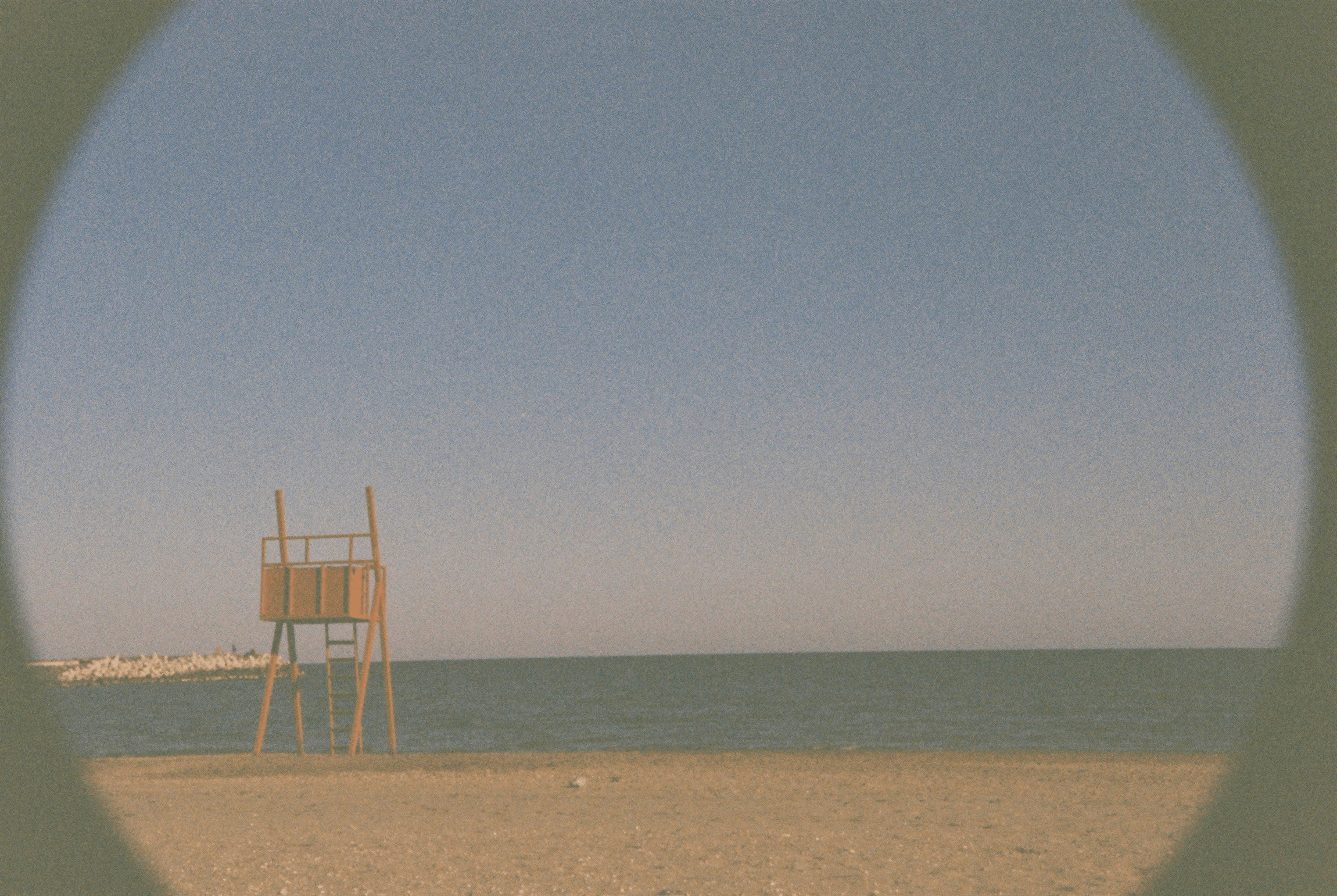 Photo of seaside in Romania, with vignette and prominent grain.