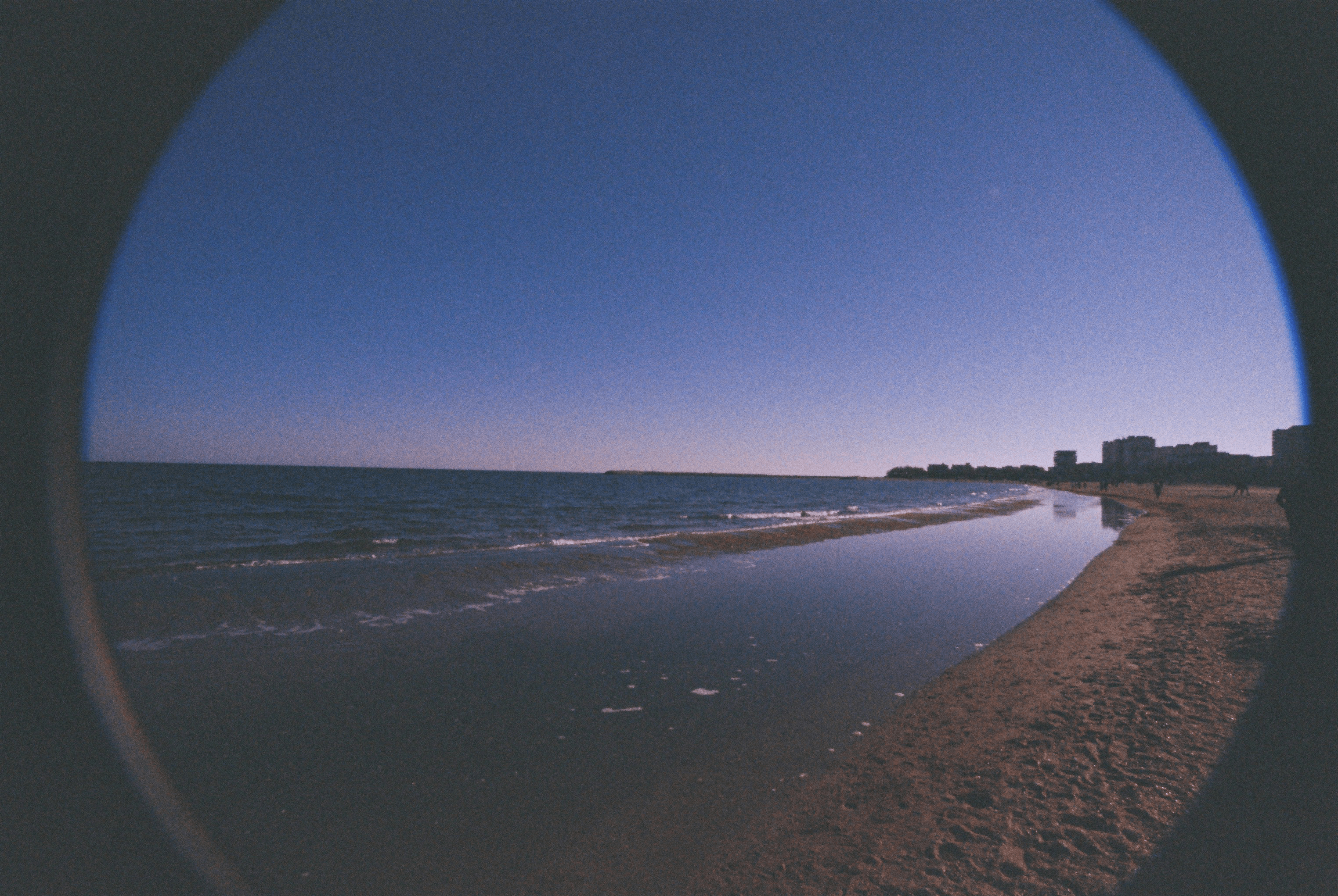 Photo of seaside in Romania, with vignette and prominent grain.