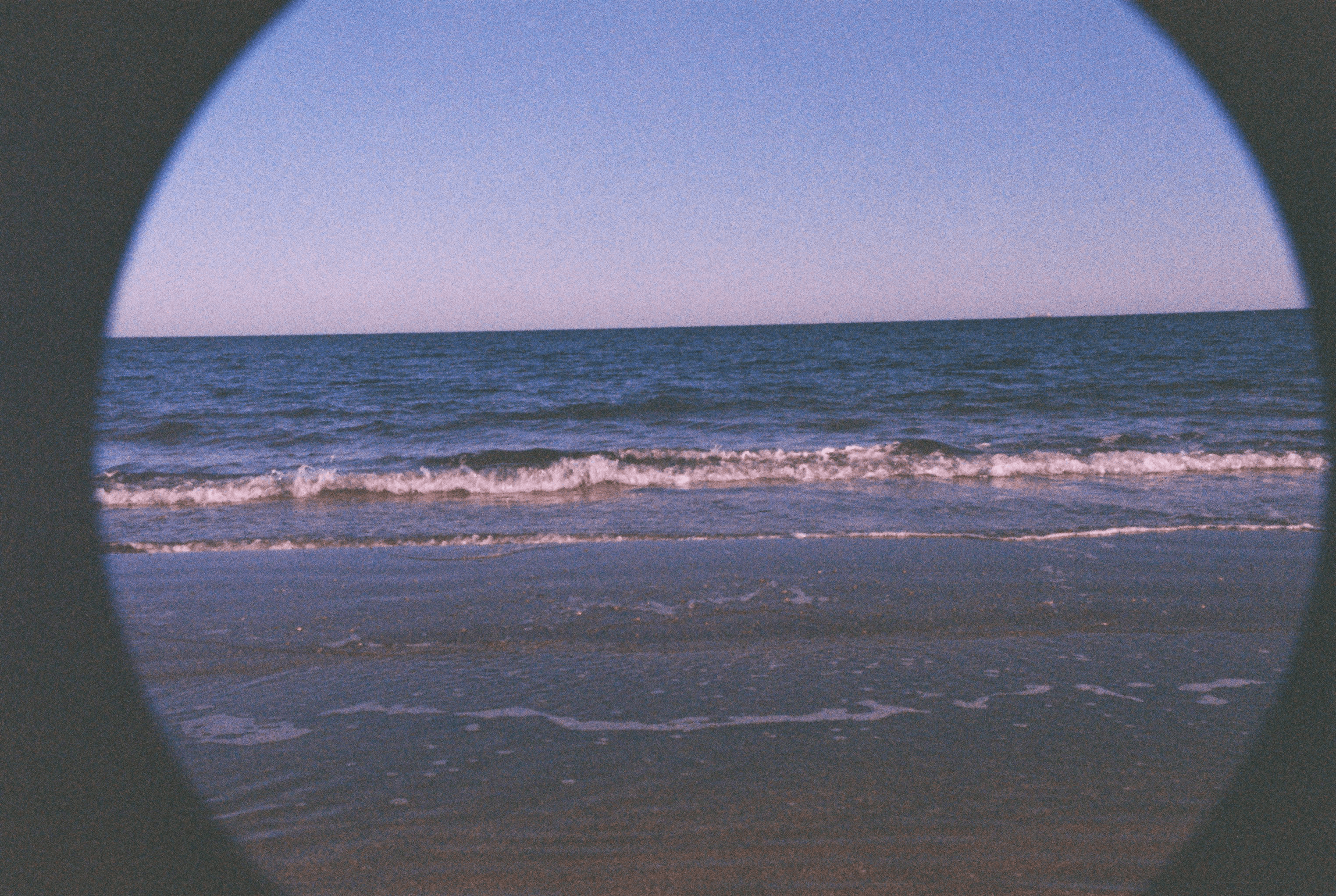 Photo of seaside in Romania, with vignette and prominent grain.